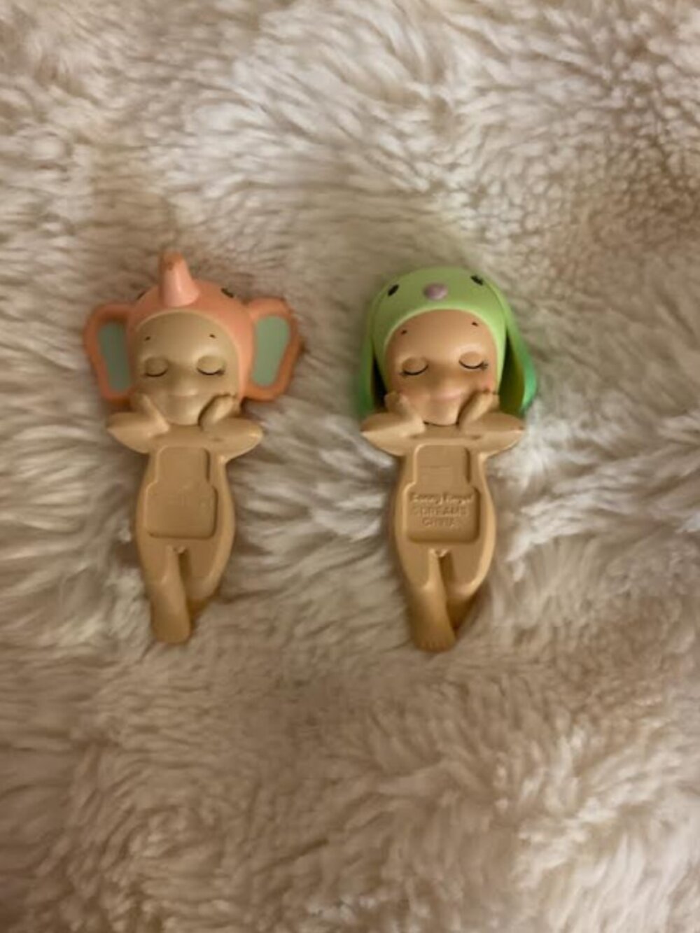 Two pink/orange and mint green Sunny angel hippers